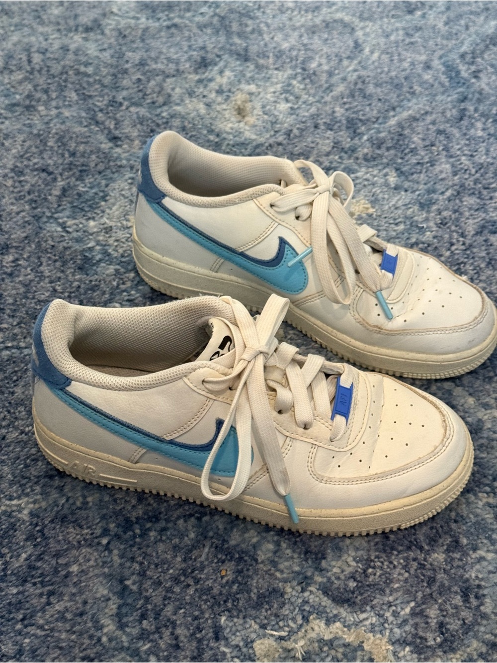 Nike Women’s White Sneakers with Light Blue Accents